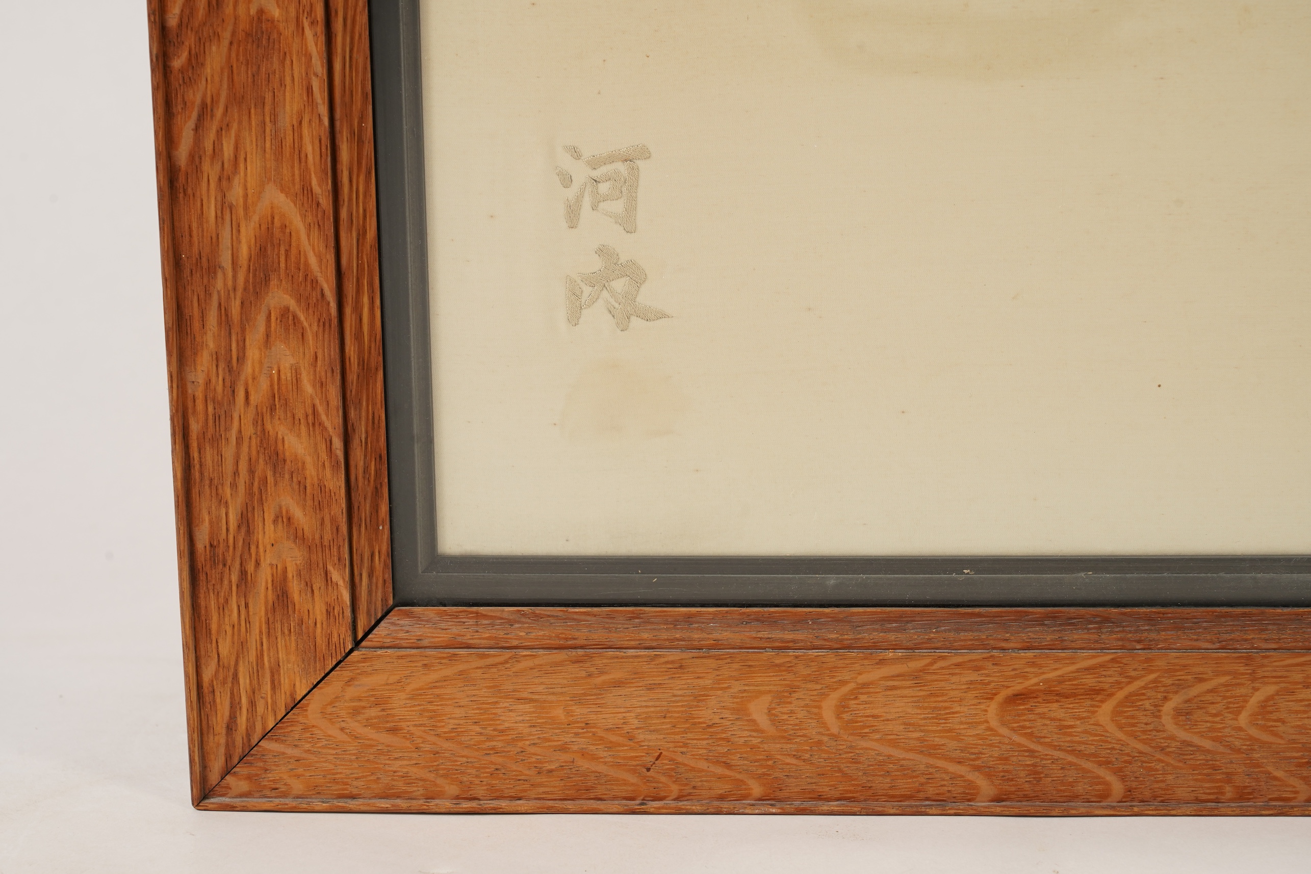 A large Japanese embroidered ‘fighting cockerels’ panel, Meiji period, signed Kawauchi, dated August 14, 1907